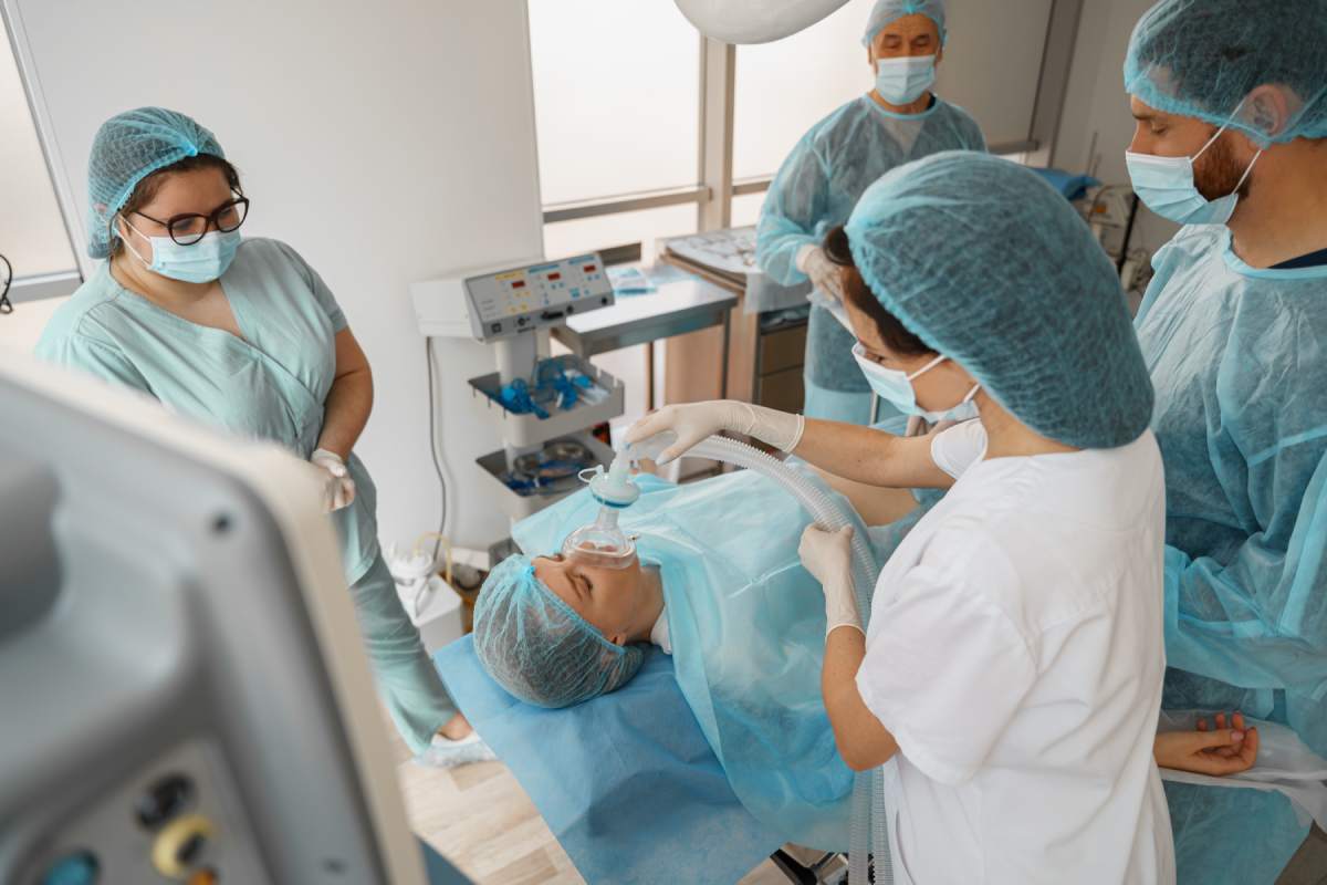 Well-trained anesthesiologist follows the patient during the surgery. High quality photo